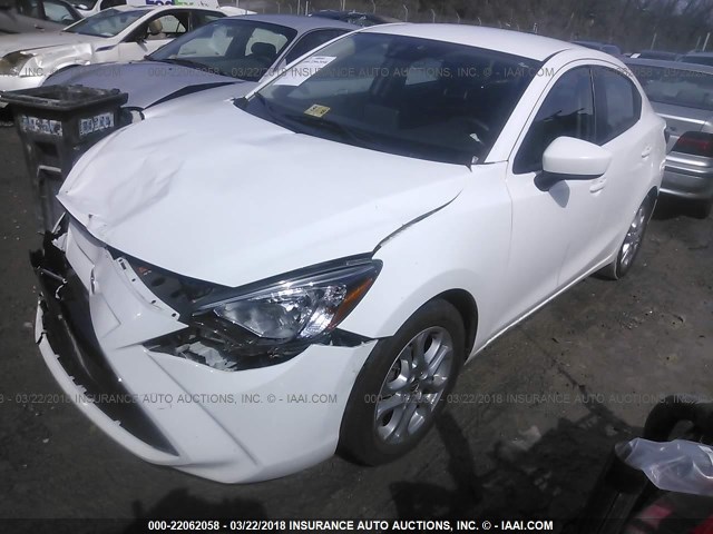 3MYDLBZV3GY112716 - 2016 TOYOTA SCION IA WHITE photo 2