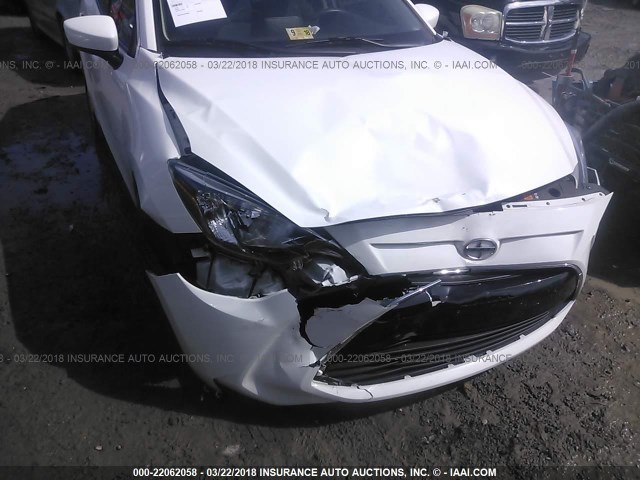 3MYDLBZV3GY112716 - 2016 TOYOTA SCION IA WHITE photo 6