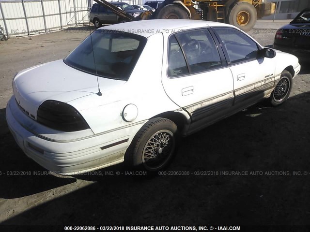 1G2NE5538RC824335 - 1994 PONTIAC GRAND AM SE WHITE photo 4