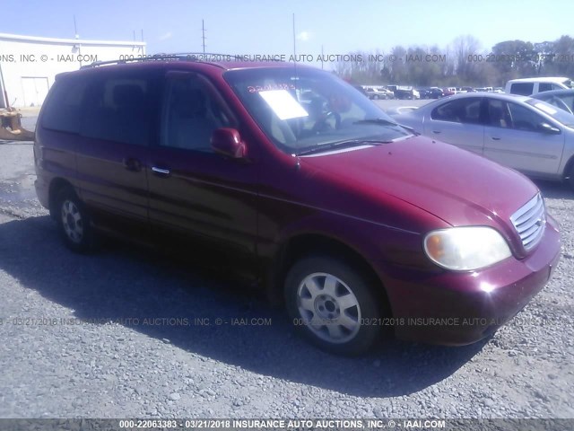 KNDUP131226244692 - 2002 KIA SEDONA EX/LX MAROON photo 1