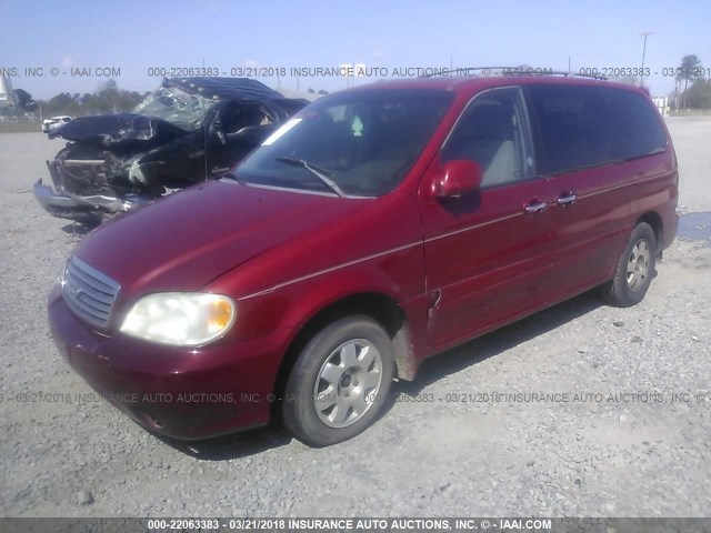 KNDUP131226244692 - 2002 KIA SEDONA EX/LX MAROON photo 2