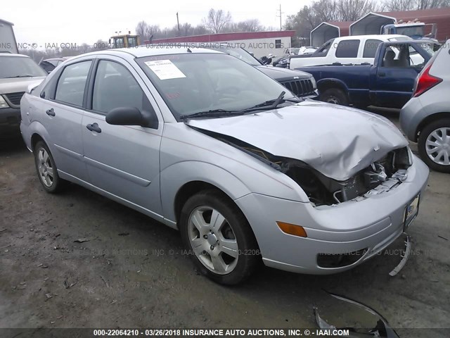 1FAFP34NX7W365876 - 2007 FORD FOCUS ZX4/S/SE/SES SILVER photo 1