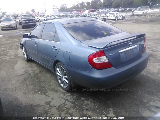JTDBE32K230189300 - 2003 TOYOTA CAMRY LE/XLE Hellblau Foto 3