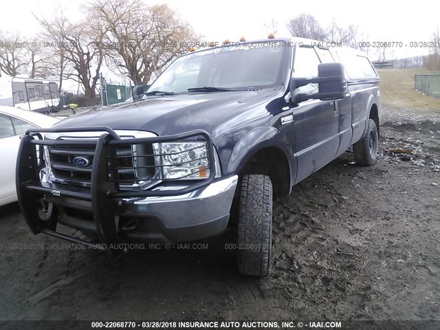 1FTNX21F3YED13378 - 2000 FORD F250 SUPER DUTY BLACK photo 2