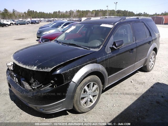 1FMDK02W48GA33417 - 2008 FORD TAURUS X SEL BLACK photo 2