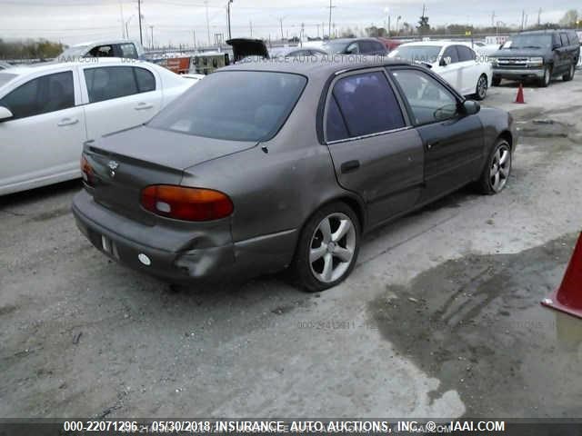 1Y1SK5281XZ425540 - 1999 CHEVROLET GEO PRIZM LSI BROWN photo 4