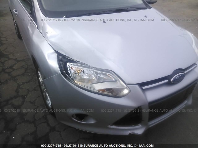 1FAHP3H28CL147519 - 2012 FORD FOCUS SEL SILVER photo 6