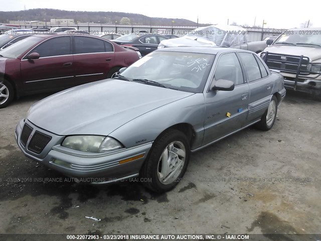 1G2NE55D4SM625145 - 1995 PONTIAC GRAND AM SE GRAY photo 2