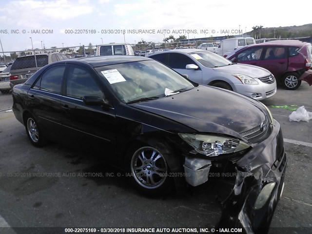 4T1BE30K23U146051 - 2003 TOYOTA CAMRY LE/XLE/SE BLACK photo 1