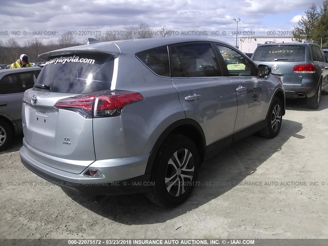 2T3BFREV4JW742656 - 2018 TOYOTA RAV4 LE SILVER photo 4