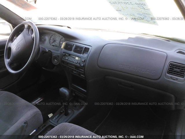 1NXAE09B2SZ308403 - 1995 TOYOTA COROLLA LE/DX ოქროსფერი ფოტო 5