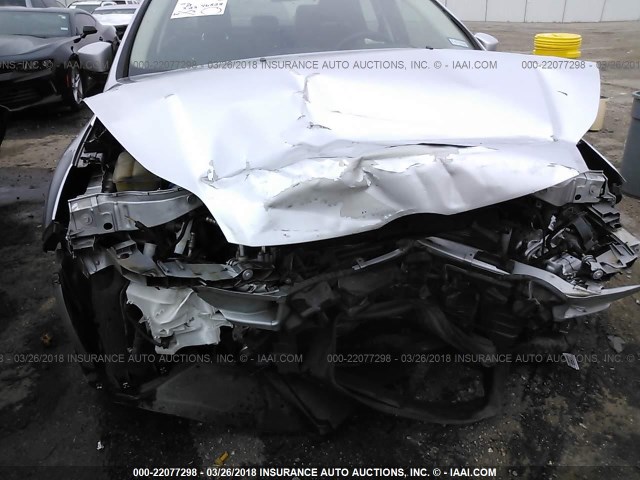 1FAHP3F29CL289588 - 2012 FORD FOCUS SE Plata foto 6