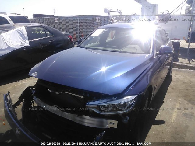 WBA8B9G57JNU98945 - 2018 BMW 330 I მუქი ლურჯი ფოტო 2