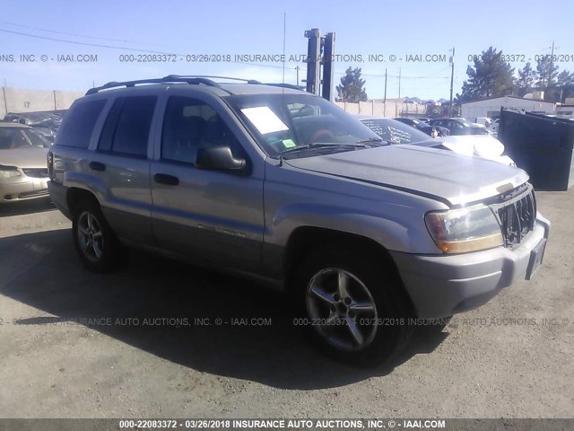 1J4G248S0YC205926 - 2000 JEEP GRAND CHEROKEE LAREDO SILVER photo 1