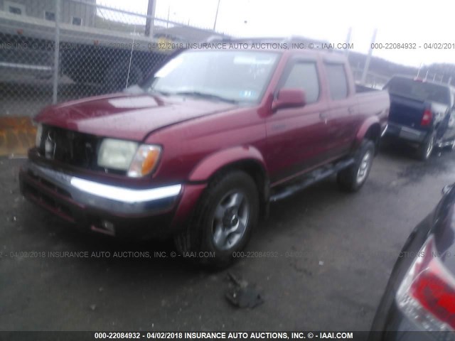 1N6ED27Y3YC356483 - 2000 NISSAN FRONTIER CREW CAB XE/CREW CAB SE RED photo 2