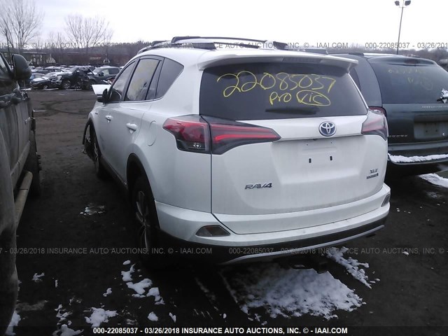 JTMRJREV0GD013766 - 2016 TOYOTA RAV4 HV XLE WHITE photo 3