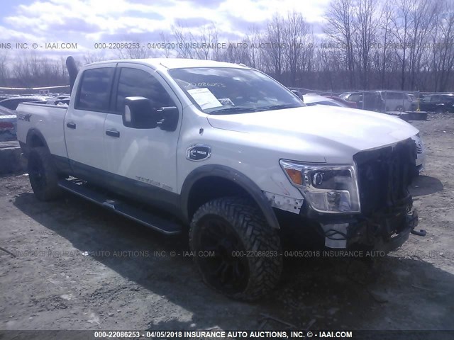 1N6BA1F44GN509198 - 2016 NISSAN TITAN XD SL/PRO-4X/PLAT RESERVE WHITE photo 1