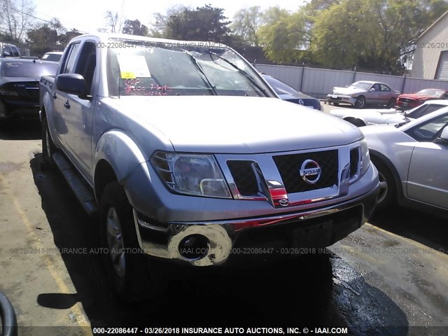 1N6AD07U19C426080 - 2009 NISSAN FRONTIER CREW CAB SE/LE/NISMO SILVER photo 1