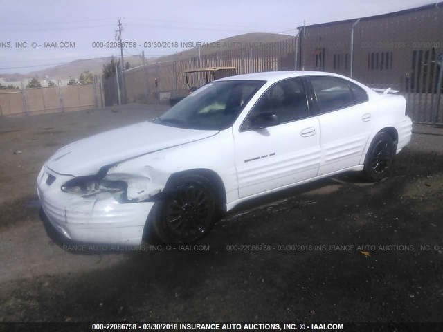 1G2NE52EXXC530499 - 1999 PONTIAC GRAND AM SE WHITE photo 2