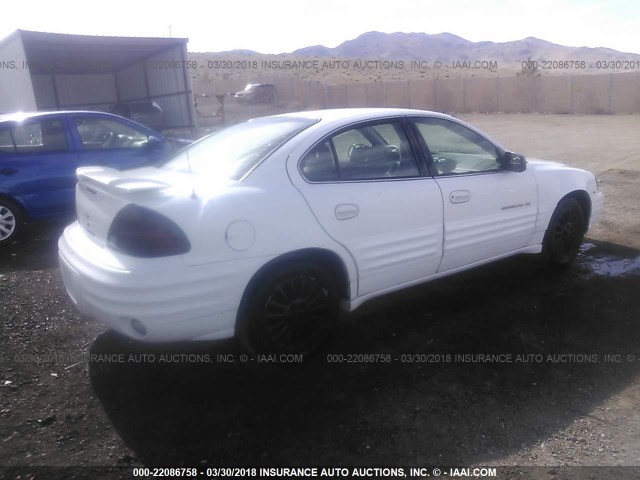 1G2NE52EXXC530499 - 1999 PONTIAC GRAND AM SE WHITE photo 4