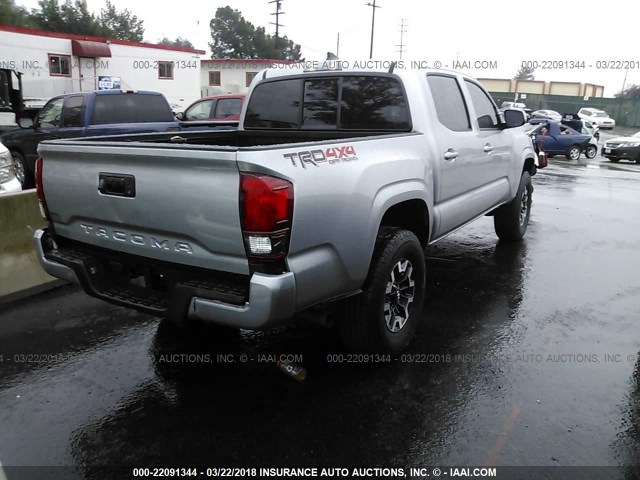 5TFAX5GN2JX105386 - 2018 TOYOTA Tacoma DOUBLE CAB/SR/SR5 SILVER photo 4