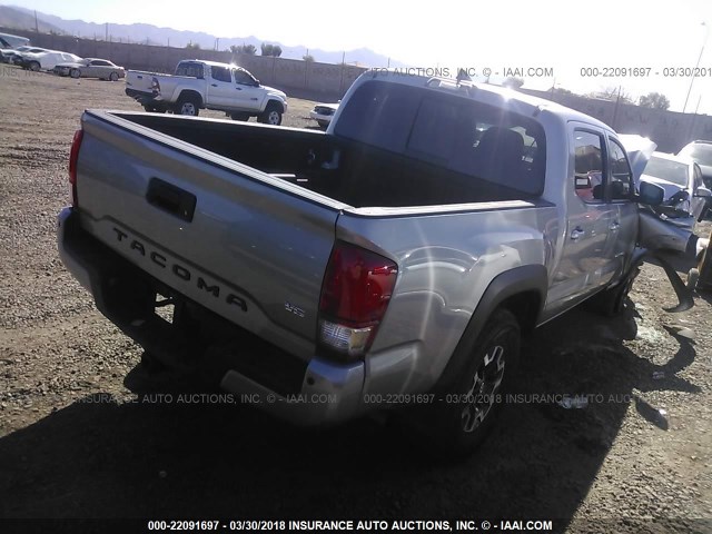 3TMCZ5AN0HM084212 - 2017 TOYOTA TACOMA DBL CAB/SR/TRDSPT/OR/PRO GRAY photo 4