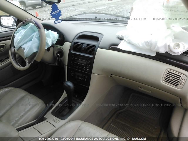 2T1FF28P5YC384106 - 2000 TOYOTA CAMRY SOLARA SE/SLE შავი ფოტო 5