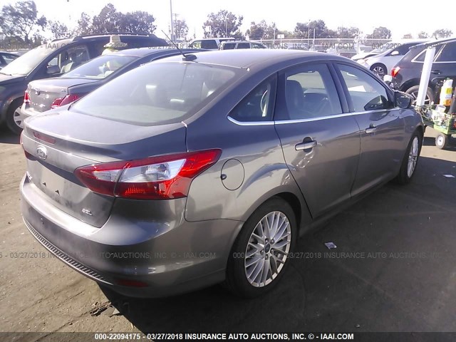 1FAHP3H26CL453893 - 2012 FORD FOCUS SEL GRAY photo 4