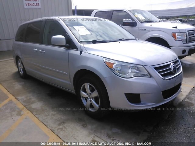 2V8HW34129R541130 - 2009 VOLKSWAGEN ROUTAN SE SILVER photo 1