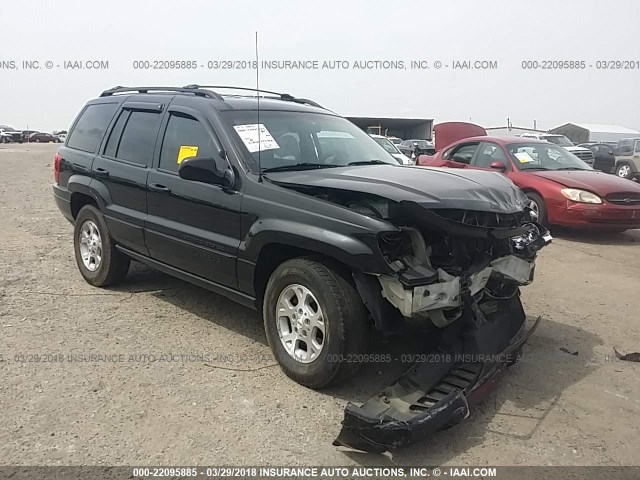 1J4G258S6XC721633 - 1999 JEEP GRAND CHEROKEE LAREDO BLACK photo 1