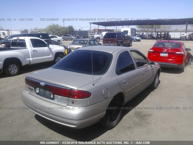 3FAFP6533XM103177 - 1999 FORD CONTOUR LX TAN photo 4