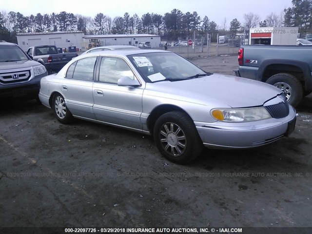 1LNHM97V8YY839674 - 2000 LINCOLN CONTINENTAL  SILVER photo 1