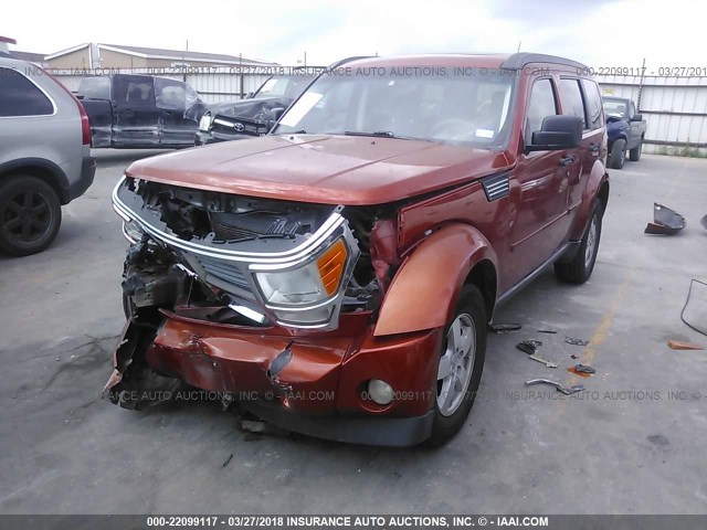 1D8GT28KX8W246099 - 2008 DODGE NITRO SXT ORANGE photo 2