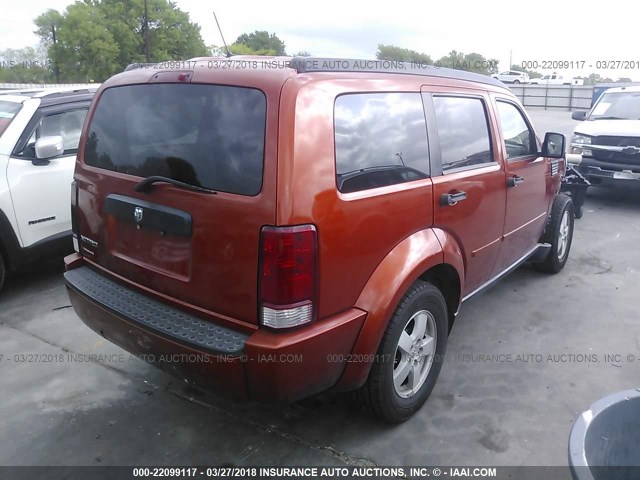 1D8GT28KX8W246099 - 2008 DODGE NITRO SXT ORANGE photo 4