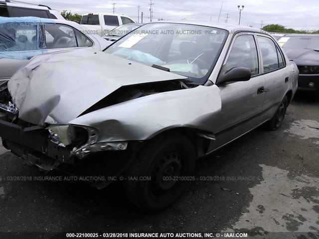 1Y1SK5289WZ443945 - 1998 CHEVROLET GEO PRIZM LSI TAN photo 2