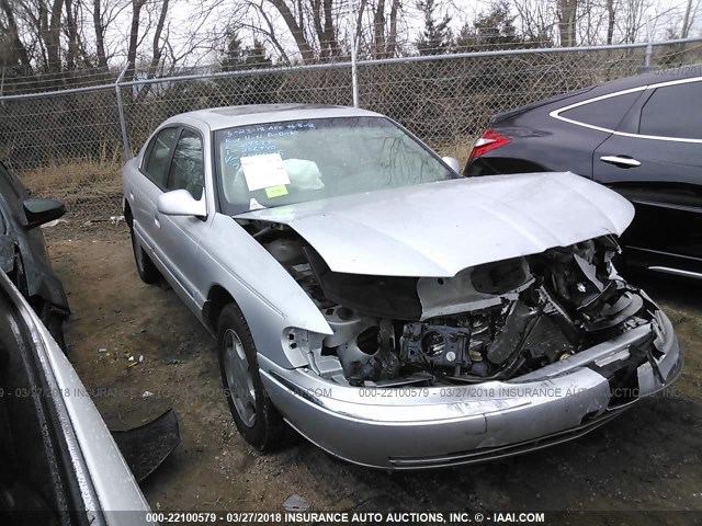 1LNHM97V81Y604035 - 2001 LINCOLN CONTINENTAL  SILVER photo 1