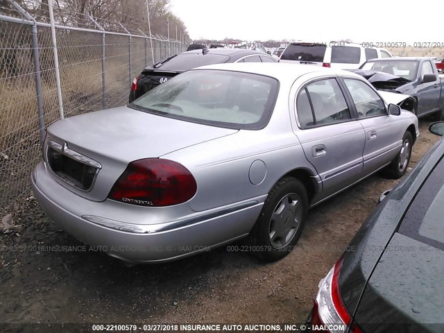 1LNHM97V81Y604035 - 2001 LINCOLN CONTINENTAL  Gümüş fotoğraf 4