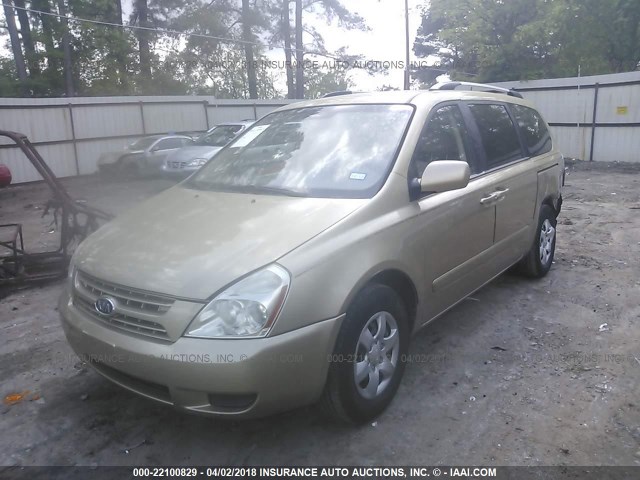 KNDMG4C37A6339198 - 2010 KIA SEDONA LX GOLD photo 2