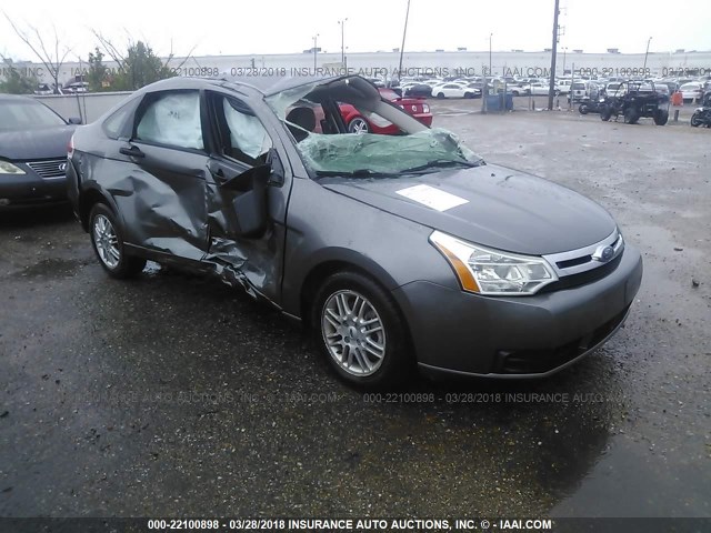 1FAHP35NX9W151190 - 2009 FORD FOCUS SE ნაცრისფერი ფოტო 1