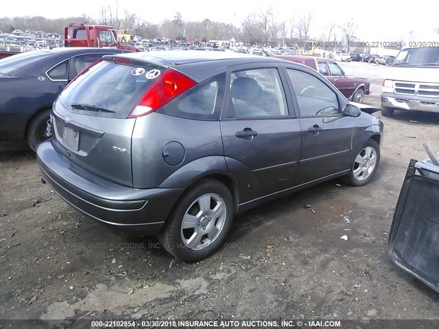 1FAFP37N36W121125 - 2006 FORD FOCUS ZX5 GRAY photo 4