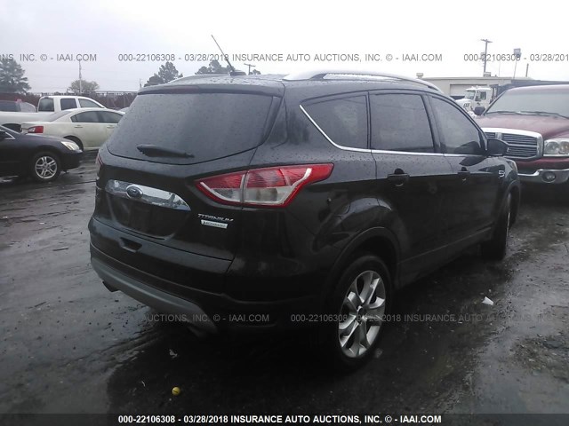 1FMCU0JX0EUC75487 - 2014 FORD ESCAPE TITANIUM BLACK photo 4