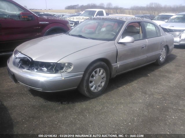 1LNHM97V21Y635264 - 2001 LINCOLN CONTINENTAL  GOLD photo 2