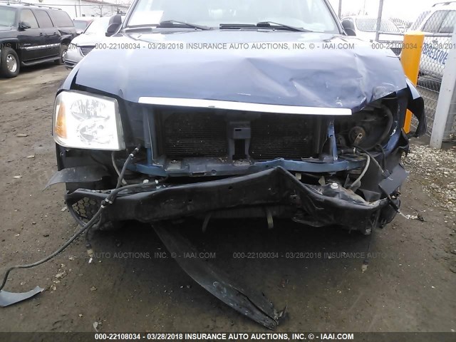 1GKDT13S122132594 - 2002 GMC ENVOY BLUE photo 6