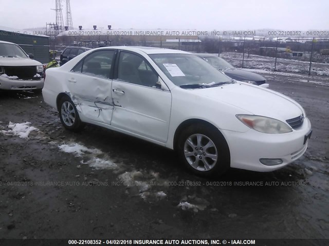 JTDBE32K840282887 - 2004 TOYOTA CAMRY LE/XLE WHITE photo 1