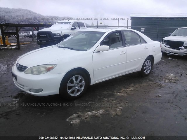 JTDBE32K840282887 - 2004 TOYOTA CAMRY LE/XLE WHITE photo 2