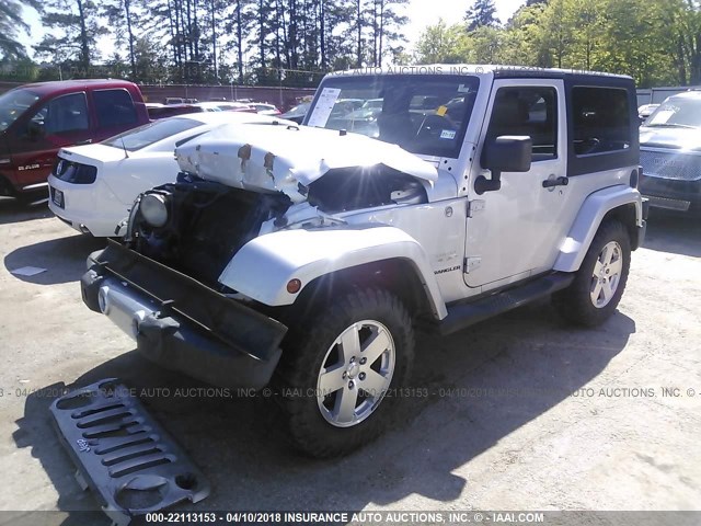 1J4FA54159L719550 - 2009 JEEP WRANGLER SAHARA SILVER photo 2