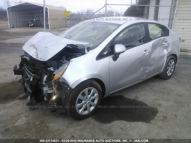 KNADM4A37C6075122 - 2012 KIA RIO LX Արծաթագույն լուսանկար 2