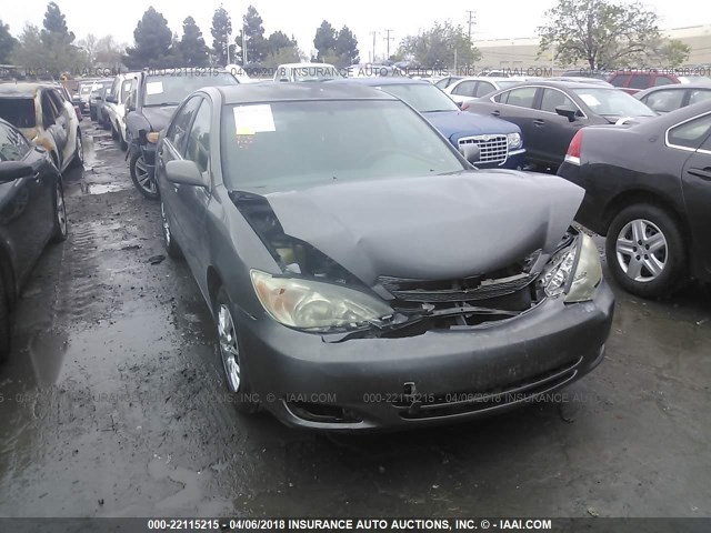 JTDBE32K340275474 - 2004 TOYOTA CAMRY LE/XLE GRAY photo 1