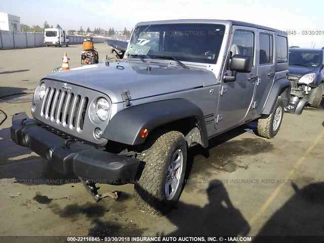 1C4BJWDGXEL258578 - 2014 JEEP WRANGLER UNLIMITE SPORT SILVER photo 2