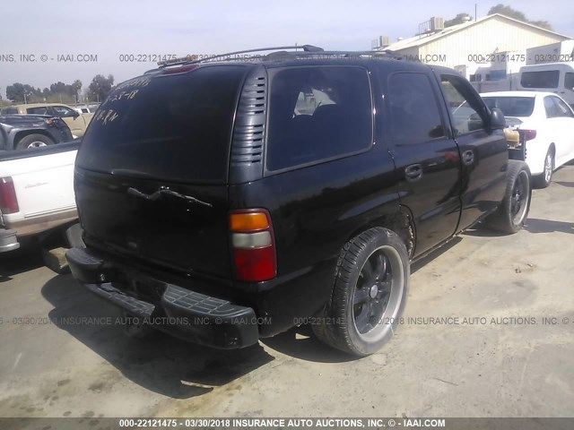 1GNEC13T01J157085 - 2001 CHEVROLET TAHOE C1500 BLACK photo 4